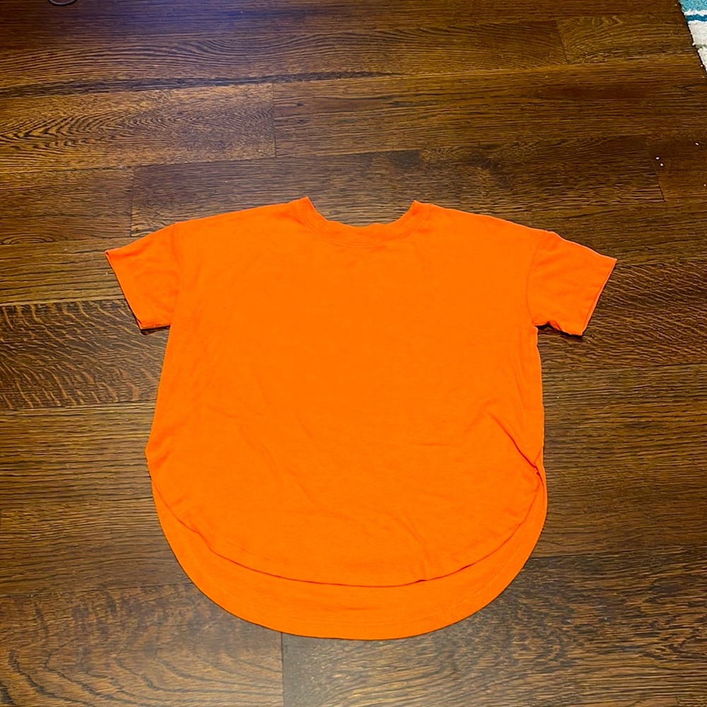 Soft, peach orange short sleeve shirt